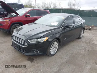 2016 Ford Fusion Energi SE Luxury with VIN 3FA6P0PU2GR322430, listed as a IAAI auction lot 42038508 with 114,980 mi miles. Bid and sale history available at carsss.com. Image 2.
