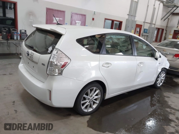 2014 Toyota Prius Two with VIN JTDZN3EU2E3333795, listed as a IAAI auction lot 41042005 with 102,198 mi miles and . Bid and sale history available at DreamBid. Image 4.