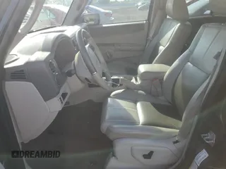 2010 Jeep Commander Limited with VIN 1J4RG5GT1AC129682, listed as a Copart auction lot 55215375 with 36,906 mi miles and Salvage title. Bid and sale history available at DreamBid. Image 7.