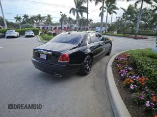 2012 Rolls-Royce Ghost z VIN SCA664L5XCUX65XXX, wystawiony jako Copart lot #59266345 z przebiegiem 70 898 mil mil oraz Tytuł czysty. Historia ofert i sprzedaży dostępna na DreamBid. Obrazek 4.
