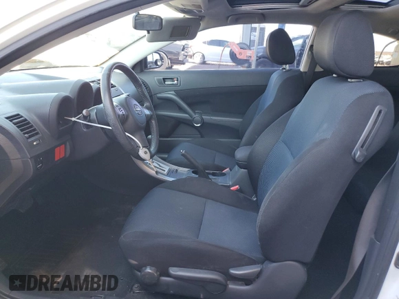2007 Scion tC Spec z VIN JTKDE177070156179, wystawiony jako Copart lot #52797735 z przebiegiem 155 795 mil mil oraz Szkoda całkowita • Salvage title. Historia ofert i sprzedaży dostępna na DreamBid. Obrazek 7.