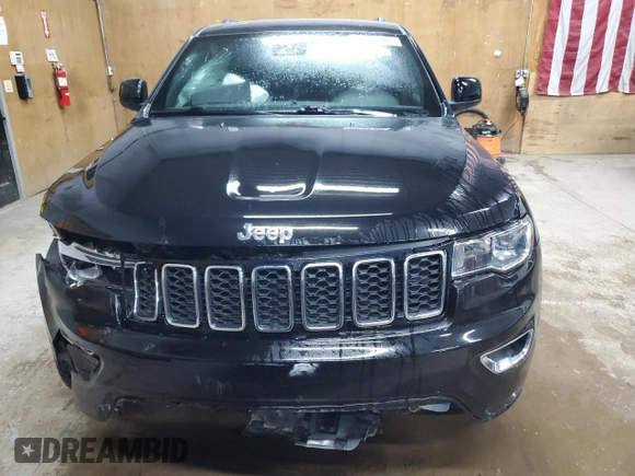2021 Jeep Grand Cherokee Laredo E with VIN 1C4RJFAG4MC717010, listed as a Copart auction lot 56033035 with 75,054 mi miles and Salvage title. Bid and sale history available at DreamBid. Image 5.