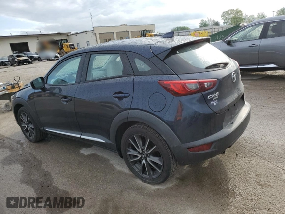 2017 Mazda CX-3 Grand Touring z VIN JM1DKFD75H0141048, wystawiony jako Copart lot #55752185 z przebiegiem 89 960 mil mil oraz Szkody całkowita. Historia ofert i sprzedaży dostępna na DreamBid. Obrazek 2.