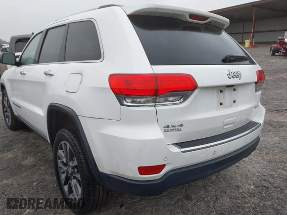 2018 Jeep Grand Cherokee Limited with VIN 1C4RJFBG8JC245999, listed as a IAAI auction lot 42345499 with 90,670 mi miles and . Bid and sale history available at DreamBid. Image 3.