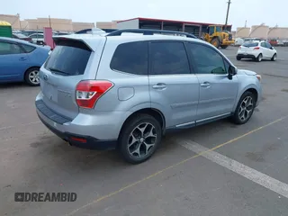 2016 Subaru Forester XT Touring with VIN JF2SJGXC7GH491999, listed as a IAAI auction lot 41907092 with 104,923 mi miles and . Bid and sale history available at DreamBid. Image 4.