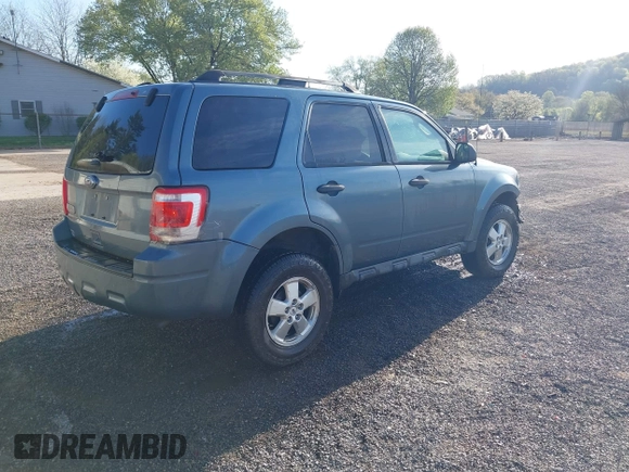 2012 Ford Escape XLT with VIN 1FMCU9D77CKB63827, listed as a IAAI auction lot 42044393 with 231,933 mi miles and . Bid and sale history available at DreamBid. Image 4.