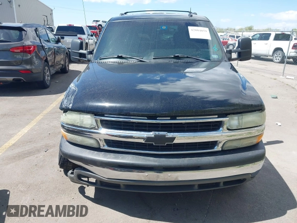 2003 Chevrolet Suburban LT z VIN 3GNGC26G83G210035, wystawiony jako IAAI lot #42084859 z przebiegiem 145 919 mil mil oraz . Historia ofert i sprzedaży dostępna na DreamBid. Obrazek 12.