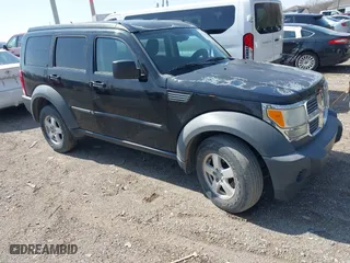 2007 Dodge Nitro SXT with VIN 1D8GU28K57W551957, listed as a IAAI auction lot 41914919 with 139,560 mi miles. Bid and sale history available at carsss.com. Image 1.