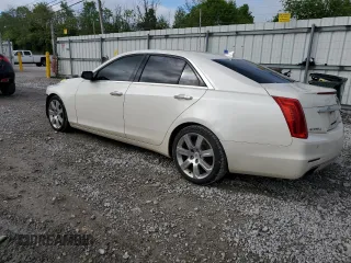 2014 Cadillac CTS Premium AWD with VIN 1G6AZ5S35E0156897, listed as a Copart auction lot 55838595 with 124,999 mi miles and Salvage title. Bid and sale history available at DreamBid. Image 2.