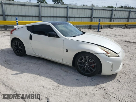 2016 Nissan 370Z z VIN JN1AZ4EH3GM931338, wystawiony jako Copart lot #43291955 z przebiegiem 69 843 mil mil oraz Szkoda całkowita • Salvage title. Historia ofert i sprzedaży dostępna na DreamBid. Obrazek 4.