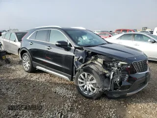 2021 Cadillac XT4 AWD Premium Luxury with VIN 1GYFZDR40MF080166, listed as a Copart auction lot 82883764 with 27,793 mi miles and Salvage Title. Bid and sale history available at carsss.com. Image 4.