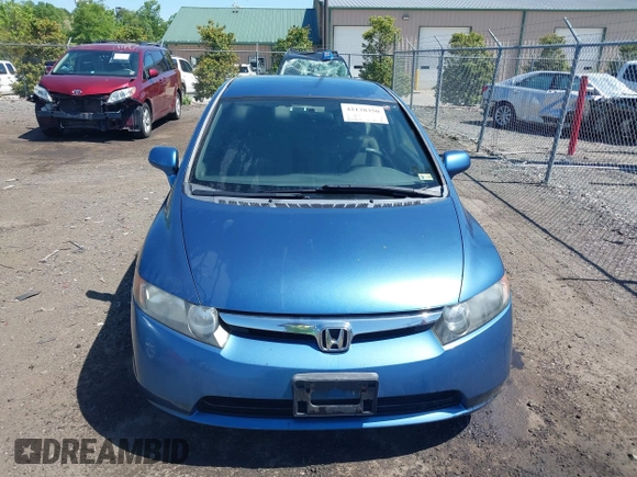 2006 Honda Civic LX with VIN JHMFA16586S000128, listed as a IAAI auction lot 42138350 with 127,253 mi miles and . Bid and sale history available at DreamBid. Image 12.