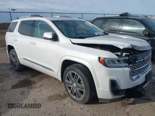 2020 GMC Acadia Denali with VIN 1GKKNXLS8LZ121704, listed as a IAAI auction lot 41665662 with 69,937 mi miles. Bid and sale history available at carsss.com. Image 1.