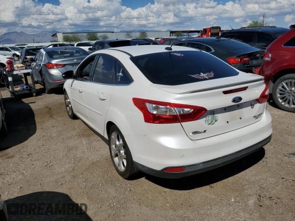 2014 Ford Focus Titanium with VIN 1FADP3J26EL132223, listed as a Copart auction lot 71490004 with 131,233 mi miles and Salvage Title. Bid and sale history available at DreamBid. Image 2.