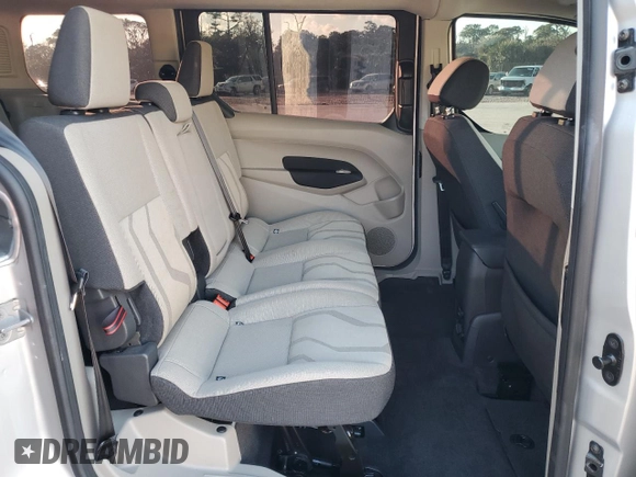 2018 Ford Transit Connect XLT z VIN NM0GE9F77J1353045, wystawiony jako Copart lot #85640224 z przebiegiem 102 944 mil mil oraz Szkoda całkowita • Salvage title. Historia ofert i sprzedaży dostępna na DreamBid. Obrazek 11.