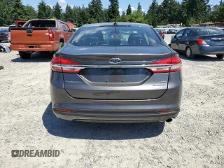 2017 Ford Fusion Hybrid SE с VIN 3FA6P0LU2HR223209, выставлен на аукционе Copart как лот 63683495 с пробегом 66 784 миль миль и Списание • Salvage title. История ставок и продаж доступна на DreamBid. Изображение 6.
