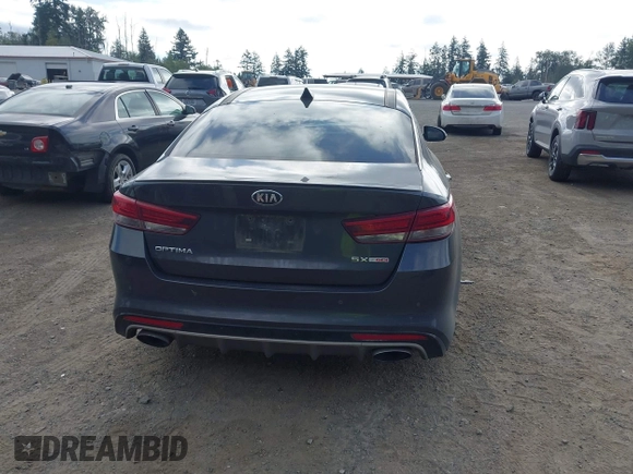 2016 Kia Optima SX Turbo z VIN 5XXGW4L28GG010897, wystawiony jako IAAI lot #42703779 z przebiegiem 121 918 mil mil oraz . Historia ofert i sprzedaży dostępna na DreamBid. Obrazek 17.