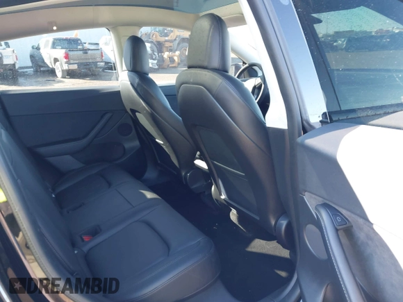 2022 Tesla Model Y Performance with VIN 7SAYGDEFXNF313636, listed as a IAAI auction lot 41660019 with 30,258 mi miles and . Bid and sale history available at DreamBid. Image 8.