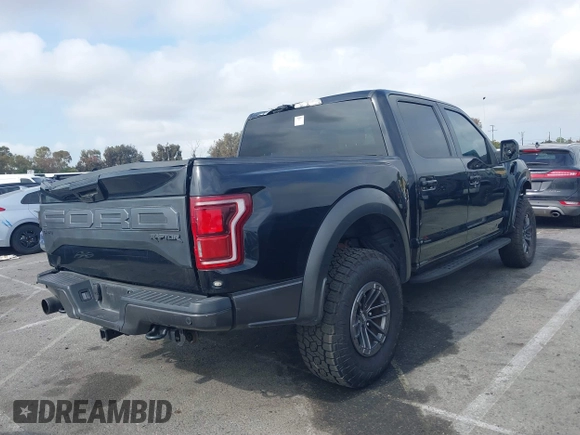 2020 Ford F-150 Raptor with VIN 1FTFW1RG2LFA30858, listed as a IAAI auction lot 42192391 with 90,018 mi miles and . Bid and sale history available at carsss.com. Image 4.