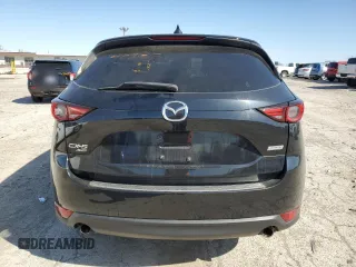 2017 Mazda CX-5 Grand Touring with VIN JM3KFBDL6H0145327, listed as a Copart auction lot 52046355 with 0 mi miles and Clean Title. Bid and sale history available at carsss.com. Image 6.