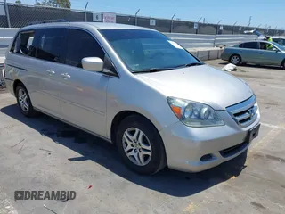2006 Honda Odyssey EX with VIN 5FNRL38416B456655, listed as a IAAI auction lot 42543308 with 291,626 mi miles and . Bid and sale history available at DreamBid. Image 1.