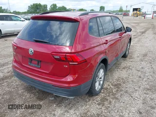 2018 Volkswagen Tiguan S with VIN 3VV1B7AX3JM045193, listed as a IAAI auction lot 42311886 with 69,049 mi miles and . Bid and sale history available at DreamBid. Image 4.