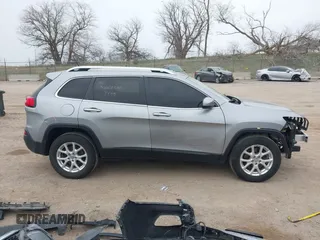 2014 Jeep Cherokee Latitude with VIN 1C4PJMCS7EW220899, listed as a IAAI auction lot 41973561 with 135,572 mi miles. Bid and sale history available at carsss.com. Image 14.