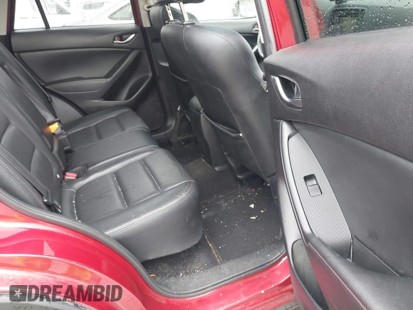 2015 Mazda CX-5 Grand Touring with VIN JM3KE4DY0F0479392, listed as a IAAI auction lot 41659415 with 141,403 mi miles. Bid and sale history available at carsss.com. Image 8.