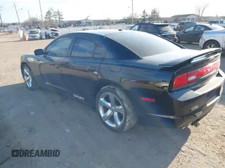 2014 Dodge Charger SXT with VIN 2C3CDXHG2EH369350, listed as a IAAI auction lot 41657478 with 120,566 mi miles. Bid and sale history available at carsss.com. Image 3.
