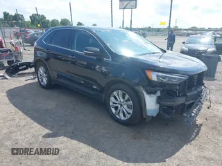 2022 Ford Edge Titanium with VIN 2FMPK4K95NBA36828, listed as a IAAI auction lot 42457835 with 51,377 mi miles and . Bid and sale history available at DreamBid. Image 1.
