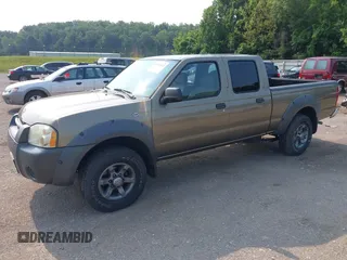 2002 Nissan Frontier XE z VIN 1N6ED29XX2C392764, wystawiony jako IAAI lot #42381542 z przebiegiem 193 919 mil mil oraz . Historia ofert i sprzedaży dostępna na DreamBid. Obrazek 2.