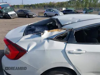 2020 Honda Civic LX with VIN 19XFC2F62LE212421, listed as a IAAI auction lot 41909995 with 46,312 mi miles and . Bid and sale history available at DreamBid. Image 17.