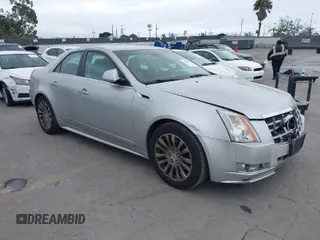2013 Cadillac CTS Performance with VIN 1G6DJ5E32D0175793, listed as a IAAI auction lot 41885572 with 109,243 mi miles and . Bid and sale history available at DreamBid. Image 1.
