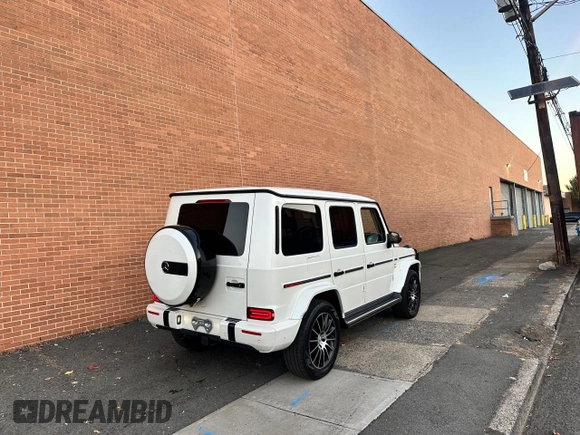 2020 Mercedes-Benz G 550 z VIN W1NYC6BJ3LX340654, wystawiony jako Copart lot #78332104 z przebiegiem 44 015 mil mil oraz Nie do naprawy. Historia ofert i sprzedaży dostępna na DreamBid. Obrazek 4.