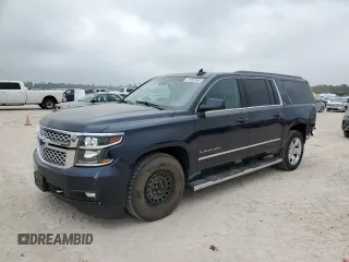 2017 Chevrolet Suburban LT with VIN 1GNSKHKC7HR229329, listed as a Copart auction lot 51582965 with 141,288 mi miles and Salvage Title. Bid and sale history available at carsss.com. Image 1.