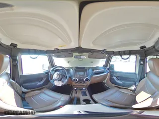 2011 Jeep Wrangler Unlimited Sahara with VIN 1J4BA5H10BL558961, listed as a Copart auction lot 74806494 with 172,855 mi miles and Salvage Title. Bid and sale history available at carsss.com. Image 14.