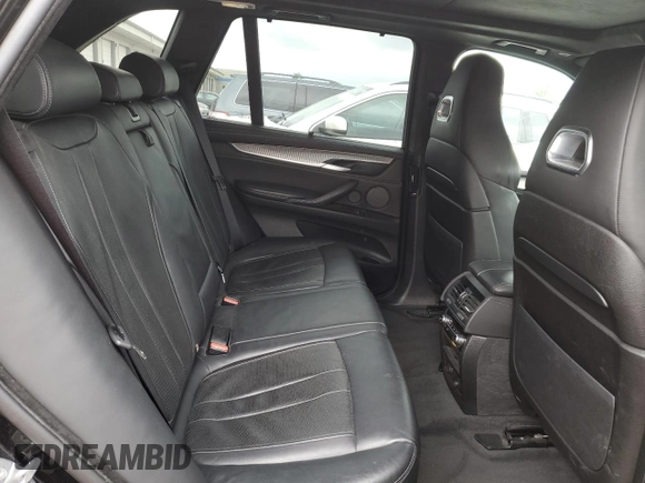 2015 BMW X5 M z VIN 5YMKT6C5XF0C89515, wystawiony jako Copart lot #54364934 z przebiegiem 151 595 mil mil oraz Szkoda całkowita • Salvage title. Historia ofert i sprzedaży dostępna na DreamBid. Obrazek 11.