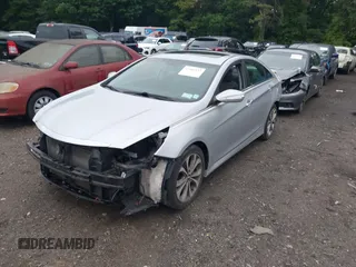 2014 Hyundai Sonata Limited z VIN 5NPEC4AC5EH922836, wystawiony jako IAAI lot #42482157 z przebiegiem 137 339 mil mil oraz . Historia ofert i sprzedaży dostępna na DreamBid. Obrazek 2.