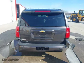 2018 Chevrolet Tahoe LT with VIN 1GNSKBKC4JR261190, listed as a IAAI auction lot 41548734 with 142,800 mi miles. Bid and sale history available at carsss.com. Image 17.