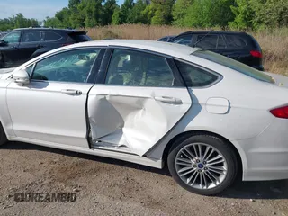 2014 Ford Fusion SE with VIN 3FA6P0H92ER340353, listed as a IAAI auction lot 42126171 with 104,484 mi miles and . Bid and sale history available at DreamBid. Image 6.