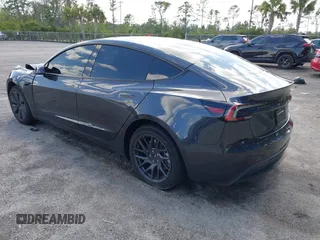 2025 Tesla Model 3 Long Range with VIN 5YJ3E1EA9SF897555, listed as a IAAI auction lot 41886716 with 6,757 mi miles and . Bid and sale history available at carsss.com. Image 3.