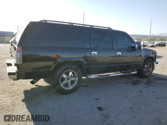 1999 Chevrolet Suburban with VIN 3GNEC16R3XG270099, listed as a Copart auction lot 71041704 with 269,329 mi miles and Salvage Title. Bid and sale history available at carsss.com. Image 3.