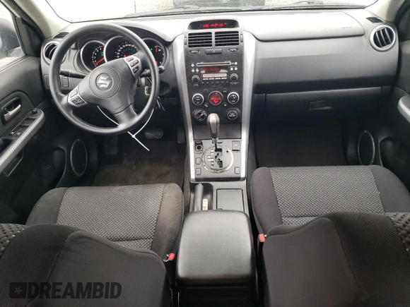 2008 Suzuki Grand Vitara w/Spare & Cargo Covers с VIN JS3TD941084101778, выставлен на аукционе Copart как лот 86121544 с пробегом 125 802 миль миль и Списание • Salvage title. История ставок и продаж доступна на DreamBid. Изображение 8.