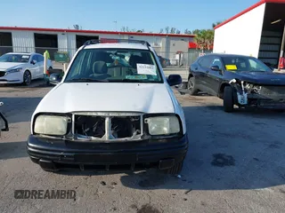 2001 Chevrolet Tracker z VIN 2CNBE13C916939402, wystawiony jako IAAI lot #42232082 z przebiegiem 103 693 mil mil oraz . Historia ofert i sprzedaży dostępna na DreamBid. Obrazek 13.