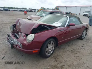 2004 Ford Thunderbird Deluxe z VIN 1FAHP60A24Y104500, wystawiony jako IAAI lot #41952791 z przebiegiem 100 795 mil mil oraz . Historia ofert i sprzedaży dostępna na DreamBid. Obrazek 2.