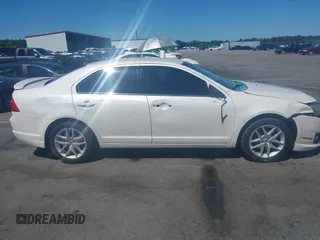 2012 Ford Fusion SEL z VIN 3FAHP0JG1CR167326, wystawiony jako IAAI lot #42320109 z przebiegiem 117 381 mil mil oraz . Historia ofert i sprzedaży dostępna na DreamBid. Obrazek 13.