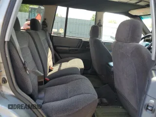 1998 Jeep Grand Cherokee Laredo z VIN 1J4GZ58S4WC278490, wystawiony jako Copart lot #62388535 z przebiegiem 133 896 mil mil oraz Czysty tytuł • Clean title. Historia ofert i sprzedaży dostępna na DreamBid. Obrazek 11.