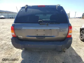 2002 Jeep Grand Cherokee Laredo with VIN 1J4GW48S62C307775, listed as a Copart auction lot 50773355 with 269,110 mi miles and Salvage Title. Bid and sale history available at carsss.com. Image 6.