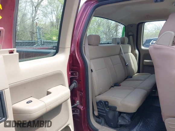 2005 Ford F-150 XLT with VIN 1FTPX14575KD79404, listed as a IAAI auction lot 42003073 with 212,050 mi miles. Bid and sale history available at carsss.com. Image 8.