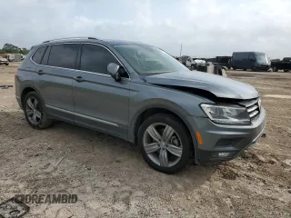 2021 Volkswagen Tiguan SE with VIN 3VV3B7AX3MM013955, listed as a Copart auction lot 51525095 with 103,626 mi miles and Salvage Title. Bid and sale history available at DreamBid. Image 4.
